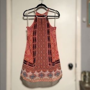 Flow dress with beaded neckline